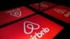 the logo of the online lodging service Airbnb displayed on a tablet in Paris