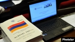 Armenia - A copy of the draft state budget for 2015 lying on a parliament deputy's desk, Yerevan, 1Dec2014.