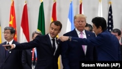 Francuski predsjednik Emmanuel Macron, predsjednik SAD Donald Trump i japanski premijer Shinzo Abe 