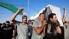 Iraqi men carry the coffin of a demonstrator, who was killed during anti-government protests, at a funeral in Najaf, Iraq October 5, 2019.