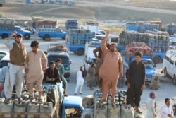 Pakistani traders, who deal in the Iranian gasoline trade across the border, protest after the Pakistani government banned smuggled Iranian gasoline, in Panjgor, Balochistan province, October 26, 2019