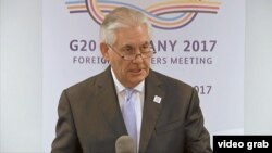 Tillerson Tells Lavrov To Honor Ukraine Commitments video grab