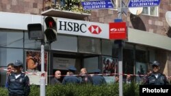 Armenia - The the entrance to a bank in Yerevan is cordoned off by police after an attempted robbery, May 3, 2018.