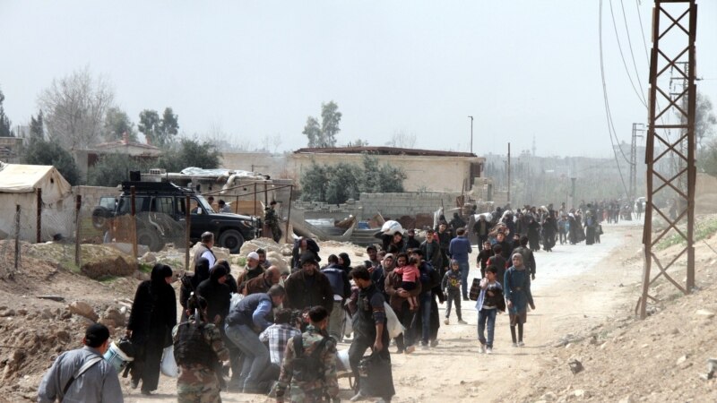 Rebelët sirianë largohen nga një enklavë në Sirinë qendrore