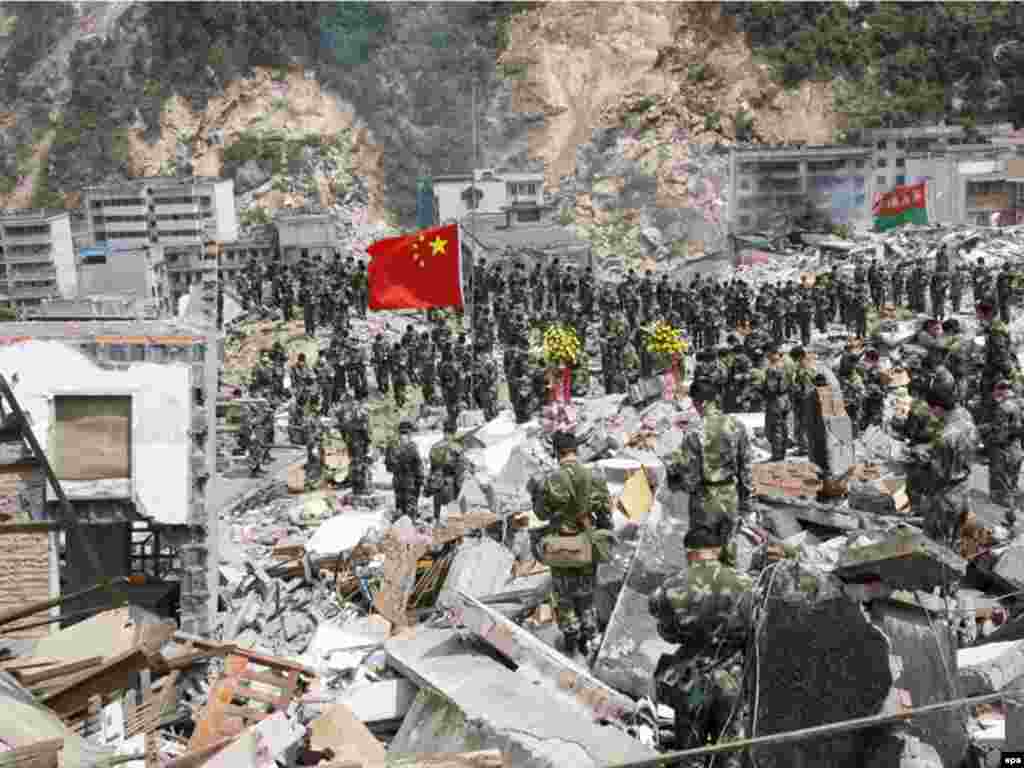 China rocked by deadly earthquake. - One week to the minute after the earthquake, now reckoned to be 8.0 magnitude, the whole nation of China stopped to think of the more than 33,000 dead, 200,000 injured and five million homeless. The full extent of the damage unleashed near Beichuan at 14 28 on 12 May has yet to be assessed with at least 50,000 casualties expected in the final tally besides the financial cost for some of China's poorest people.