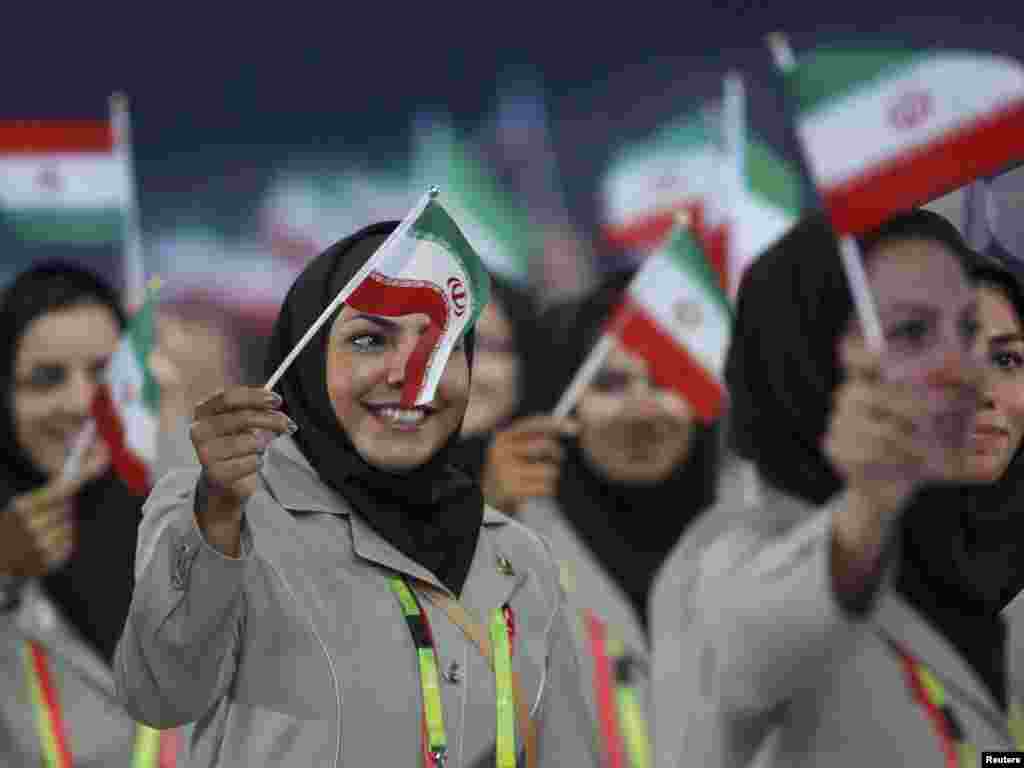 Athletes and officials from Iran take part in the opening ceremony of the 16th Asian Games in Guangzhou, in China's Guangdong Province, on November 12. Photo by Carlos Barria for Reuters