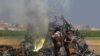 Обломки сбитого российского вертолета в сирийской провинции Идлиб