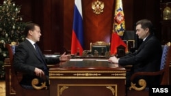 Russian President Dmitry Medvedev (left) meets with Vladislav Surkov in Gorki on December 27.