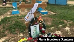 Могила российского контрактника, предположительно погибшего в Сирии.