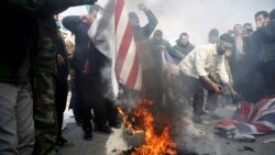Протестиращи срещу смъртта на Солеймани в Иран горят американски, британски и израелски знамена