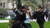 Students detained during protest against Flower Festival in Baku on May 10, 2009