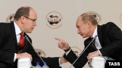 Князь Монако Альбер II и российский премьер Владимир Путин