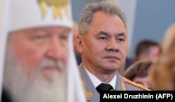 Патриарх Кирилл и Сергей Шойгу на инаугурации российского президента 7 мая 2018 года
