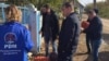 Activiștii democrați din Nisporeni împărțind ajutoare