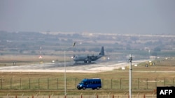 Turkey - A Hercules C-130 military aircraft maneuvres on the runway at Incirlik Air Base, in the outskirts of the city of Adana, southeastern Turkey, on July 28, 2015