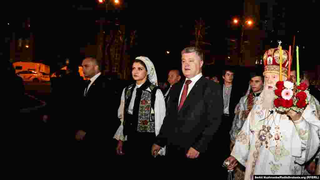 Ukrainian President Petro Poroshenko attends the Easter procession with his family, accompanied by Patriarch Filaret, the head of the Ukrainian Orthodox Church of the Kyivan Patriarchate.