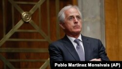 U.S. -- Senate Committee on Foreign Relations chairman Sen. Bob Corker, R-Tenn., listening to testimony by Britain's former Prime Minister David Cameron on Capitol Hill in Washington, Tuesday, March 13, 2018