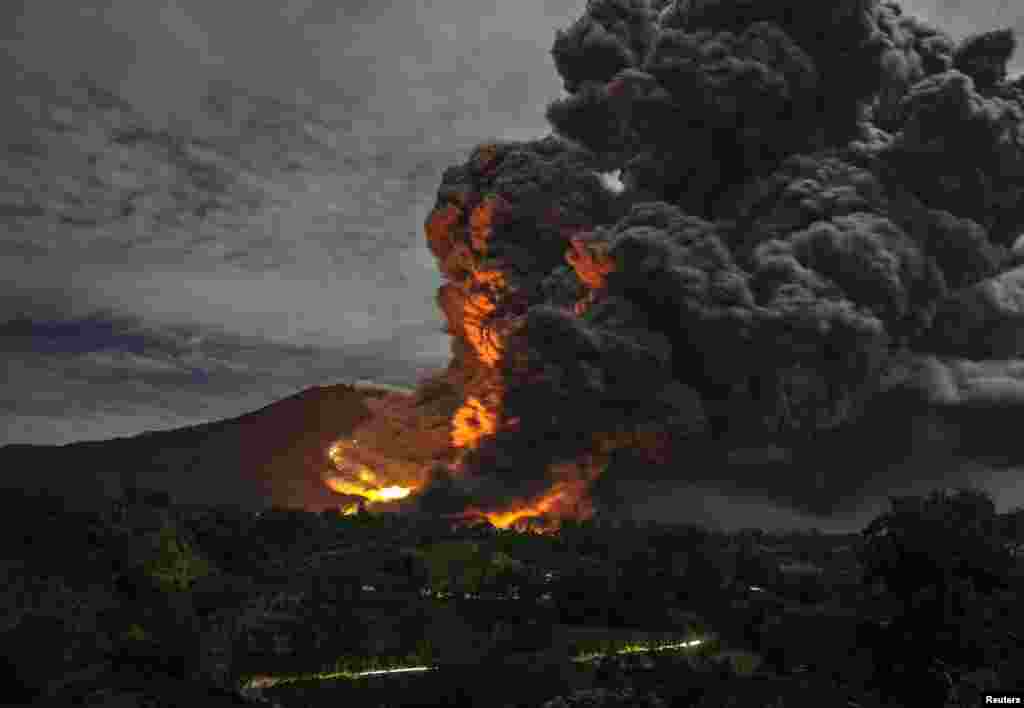 Mount Sinabung erupts as seen from Tiga Pancur village in Indonesia's North Sumatra Province. (Reuters/YT Haryono)