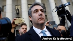 President Trump's former lawyer Michael Cohen exits Federal Court after entering a guilty plea in Manhattan, New York, on November 29.