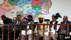 Members of the Loya Jirga listen during the first day of a four-day meeting of around 2,500 Afghan tribal elders and leaders in Kabul on November 21.