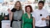 Расейскі рэжысэр Кантэмір Балагаў (справа), які зьняў фільм «Дылда», з акторкамі Вікторыяй Мірашнічэнкай (зьлева) і Васілісай Пералыгінай. Каны, 16 траўня 2019.