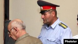 Armenia -- Levon Avagian, a former school teacher, leaves the courtroom after being sentenced to three years in prison on sex abuse charges, 4August 2010.