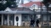 Montenegrin police guard the entrance to the U.S. Embassy compound in Podgorica on February 22.