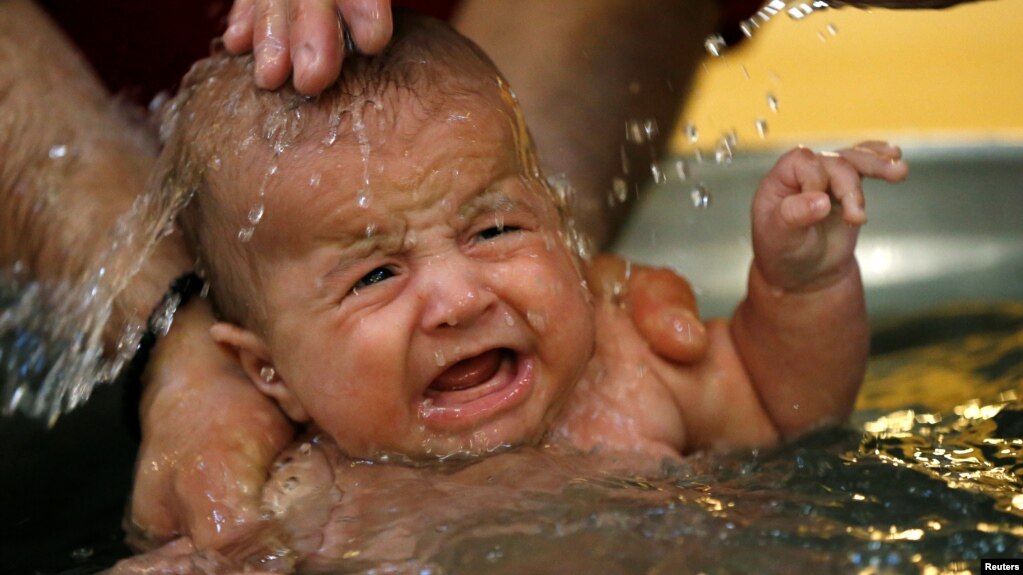 Father Foty defended his actions by saying that the ceremony does not always go quietly and that the mother was scared for her son and behaved "extremely emotionally." (illustrative photo)