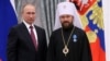 Владимир Путин и митрополит Волоколамский Иларион в Кремле, архивное фото 