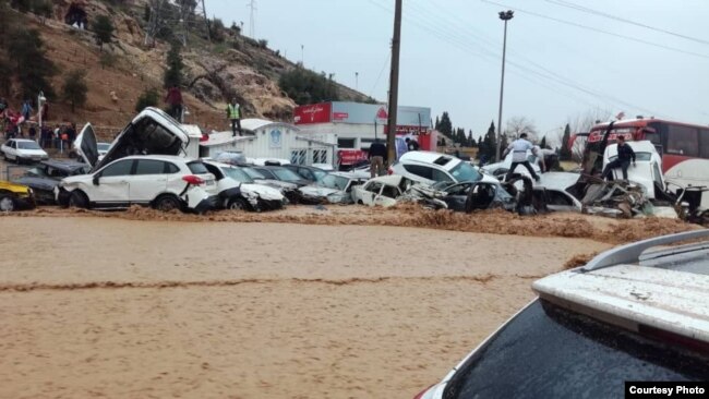 More than 200 cars were swept away in the first flash flood that hit Shiraz on March 25.