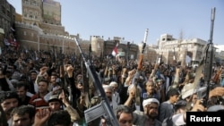Followers of the Huthi group demonstrate against the Saudi-led air strikes on Yemen in Sanaa on April 1.