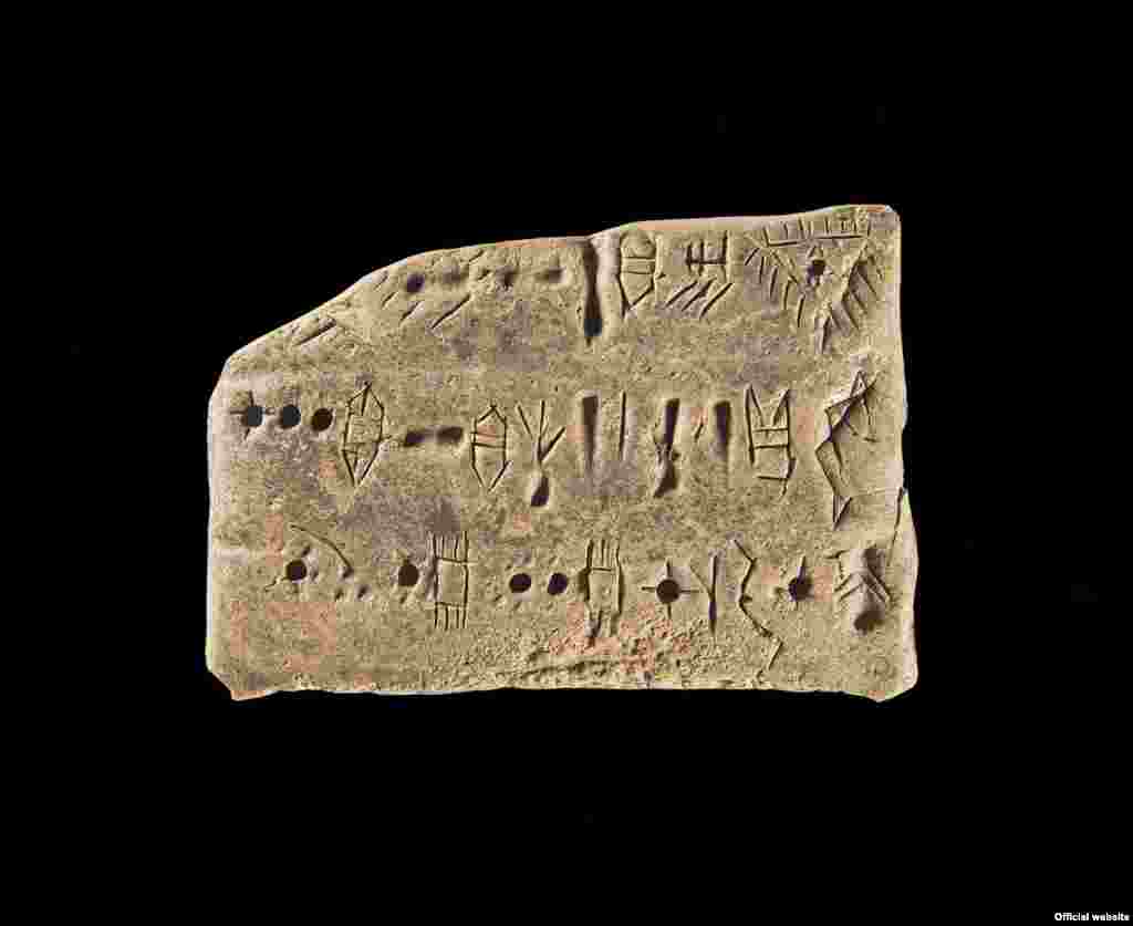 Tabletă Proto-Elamită. Tappe Yahya sfîrșitul mileniului al IV-lea î.e.n., Lut.