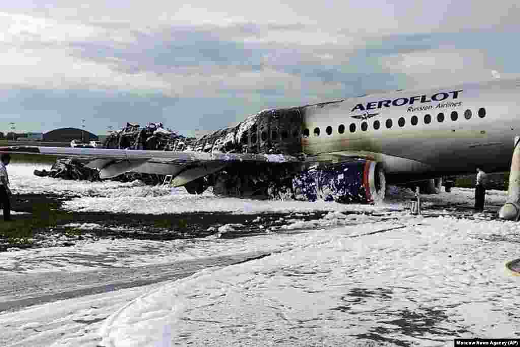 The aftermath of the May 5 tragedy at Moscow&#39;s Sheremetyevo Airport after the plane&#39;s crew issued a distress call and turned back shortly after takeoff. Amateur video appeared to show the Superjet 100 bursting into flames after bouncing violently along the runway.