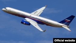 A Russian Tupolev-214 airplane with the Open Skies markings