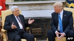 Palestinian Authority President Mahmud Abbas (left) and U.S. President Donald Trump talk in Washington, D.C., in May.