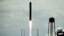 An Antares rocket, with the Cygnus cargo spacecraft aboard, launching at NASA Wallops Flight Facility in Virginia on September 18