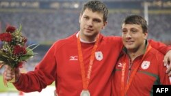 Вадзім Дзевятоўскі і Іван Ціхан падч Алімпійскіх гульняў у Пэкіне