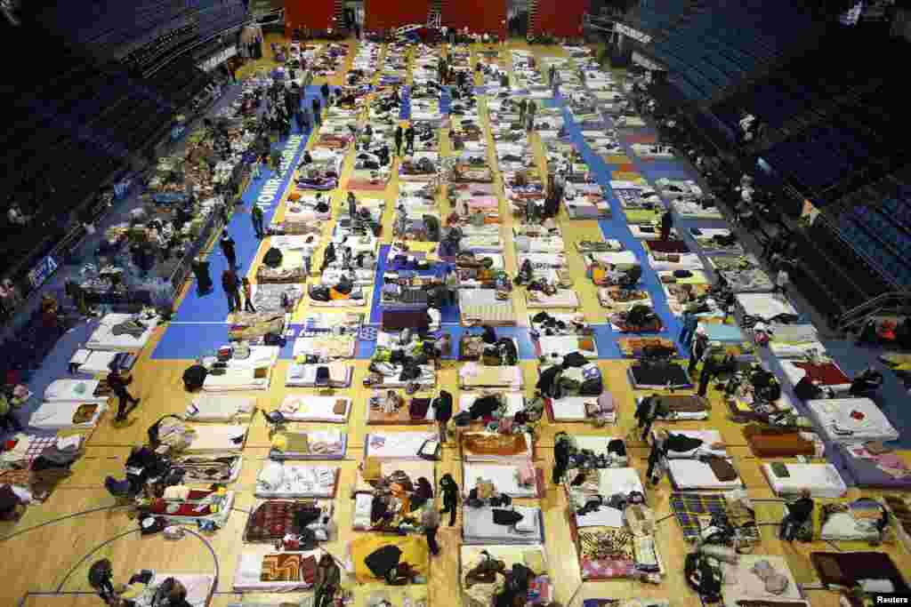 Evacuees from the Serbian town of Obrenovac take shelter at a hall in Belgrade.