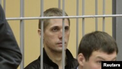 Uladzislau Kavalyou during a hearing in a court room in Minsk in September 2011