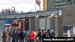 People queue to get their visas at the U.S. Embassy in Moscow in April.