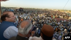 Field of dreams? The new Pakistani prime minister, Nawaz Sharif (left, at a preelection rally in Sindh Province), campaigned for the May 11 elections on a pledge to resolve the country's energy crisis.