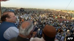 Field of dreams? The new Pakistani prime minister, Nawaz Sharif (left, at a preelection rally in Sindh Province), campaigned for the May 11 elections on a pledge to resolve the country's energy crisis.