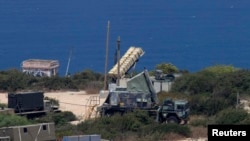 An anti-missile battery is deployed in the northern city of Haifa (file photo)
