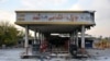 A picture taken on November 17, 2019 shows a scorched gas station that was set ablaze by protesters during a demonstration against a rise in gasoline prices in Eslamshahr, near the Iranian capital of Tehran.