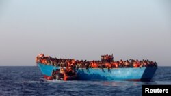 Fotoarhiv: Migranti kod obale Libije 