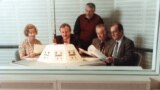 Germany--Former RFE/RL Czechoslovak Service Director Pavel Pechacek (second from left) at RFE/RL's Munich headquarters with fellow journalists.