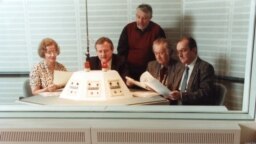 Germany--Former RFE/RL Czechoslovak Service Director Pavel Pechacek (second from left) at RFE/RL's Munich headquarters with fellow journalists.