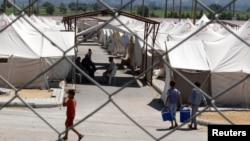 Один из лагерей сирийских беженцев в Турции