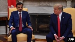 دونالد ترمپ رئیس جمهور ایالات متحدۀ امریكا و امیر شیخ تمیم بن حمد آل ثانی رهبر قطر