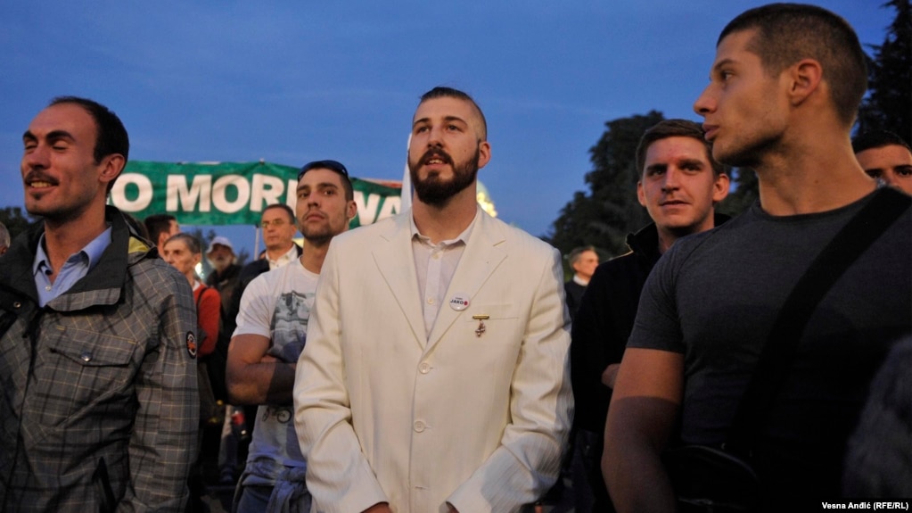 Maksimovic, wearing his trademark white suit, at a September 2016 protest against a controversial development project in Belgrade.